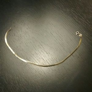 14kt gold herring bone bracelet.